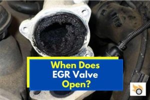 Mechanic cleaning out an EGR valve from a Volkswagen diesel.